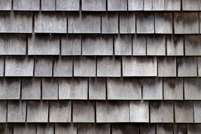 Close-up of aged, weathered wood shake shingles